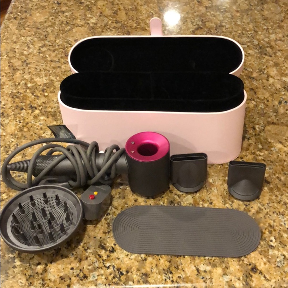 Dyson hairdryer with attachments